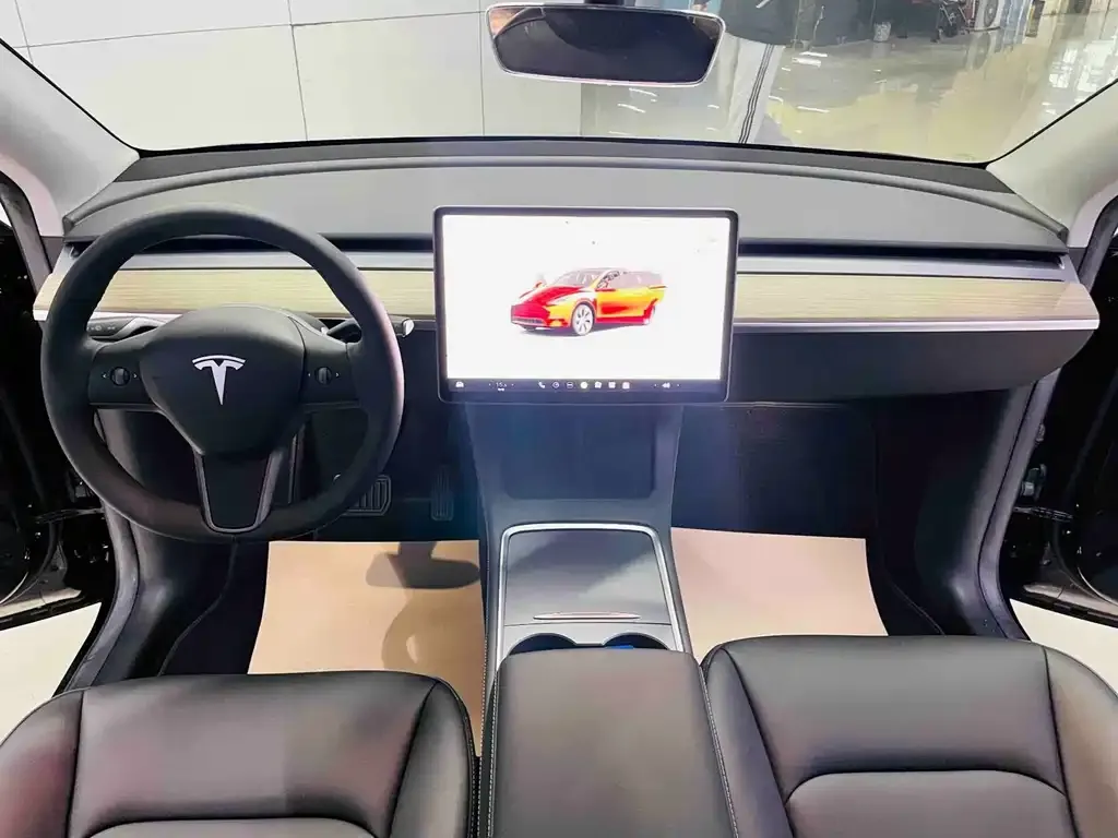 Tesla Model Y — фото 7