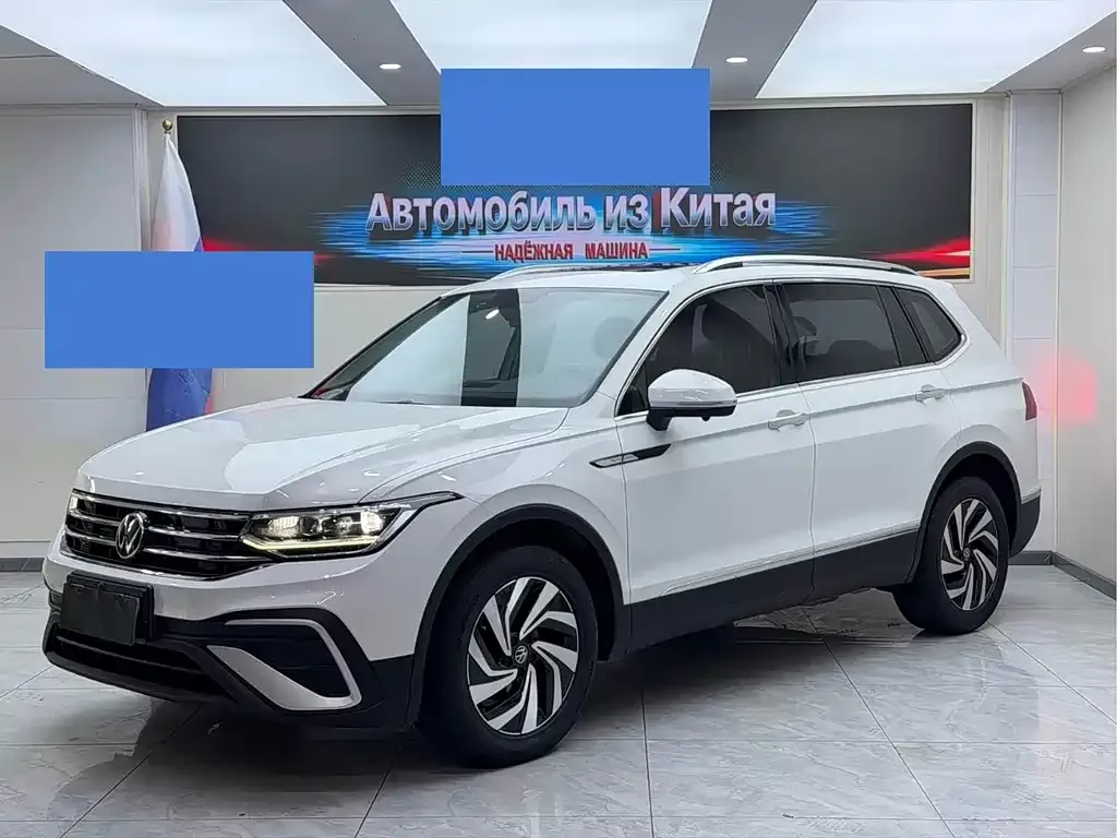Volkswagen Tiguan L — фото 1