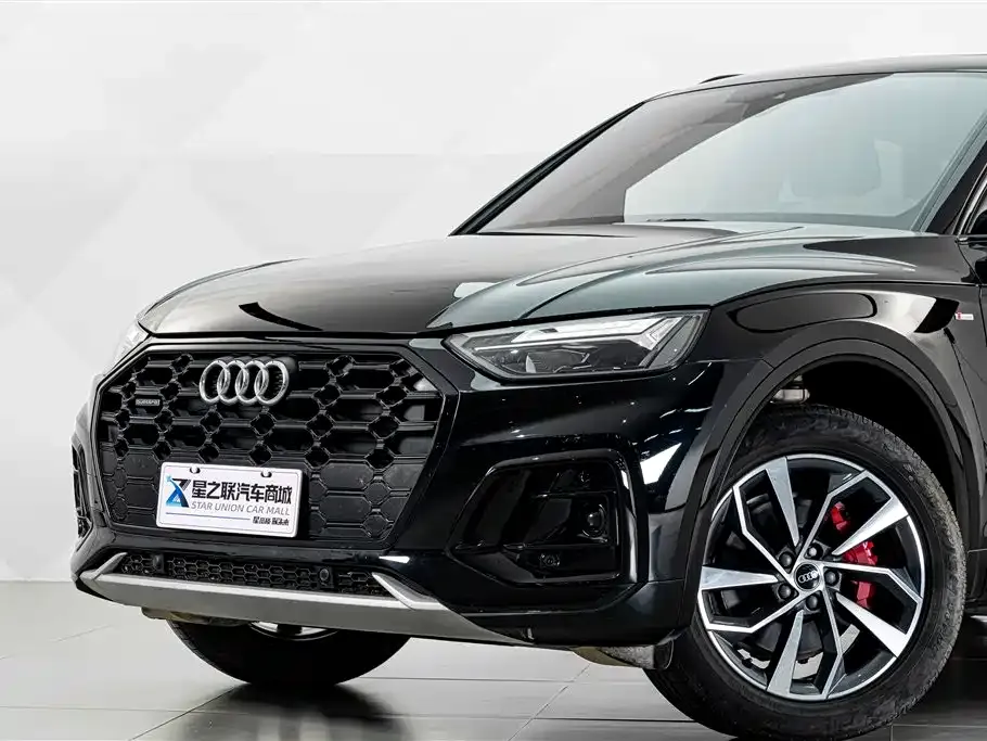 Audi Q5L — фото 10