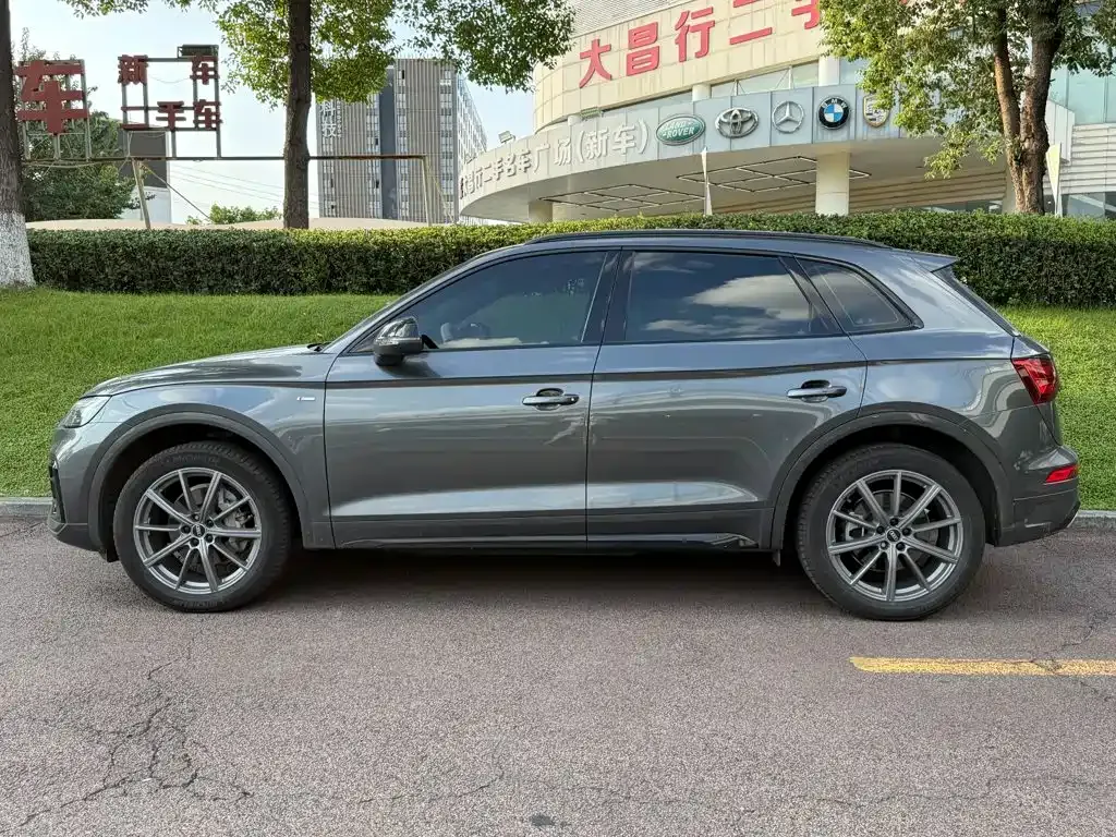 Audi Q5L — фото 10