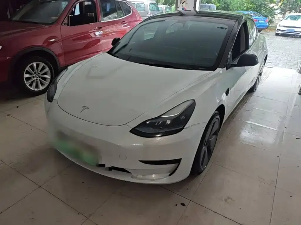 Tesla Model 3 — фото 10