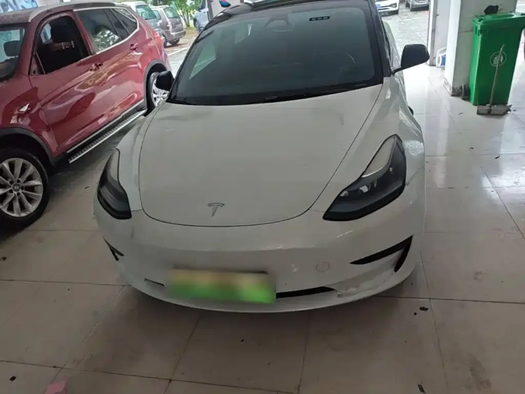 Tesla Model 3 — фото 9