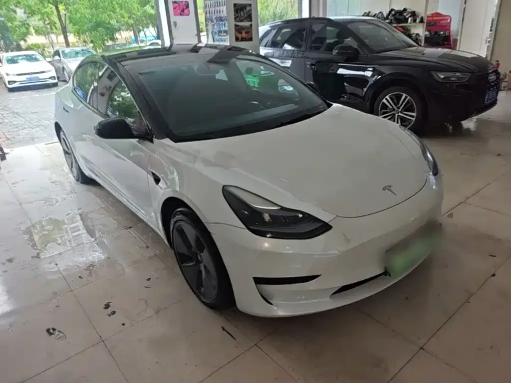 Tesla Model 3 — фото 7