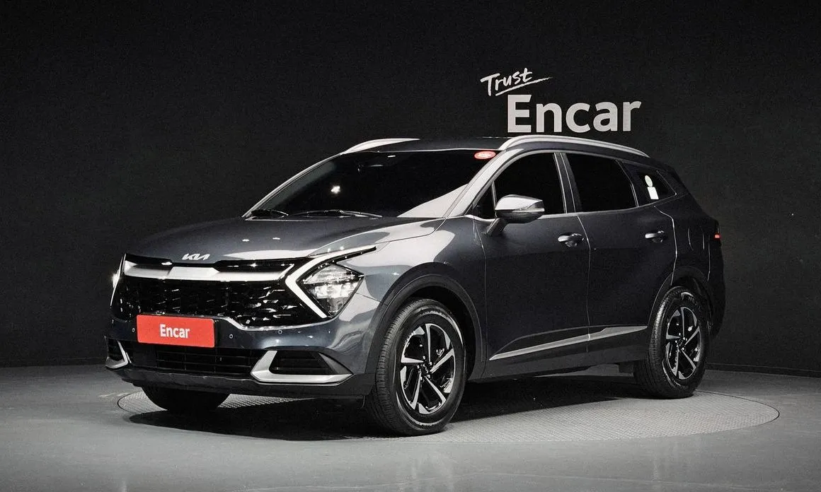 Kia Sportage — фото 1