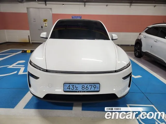 Tesla Model Y — фото 1