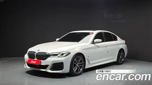BMW 5-Series — фото 1