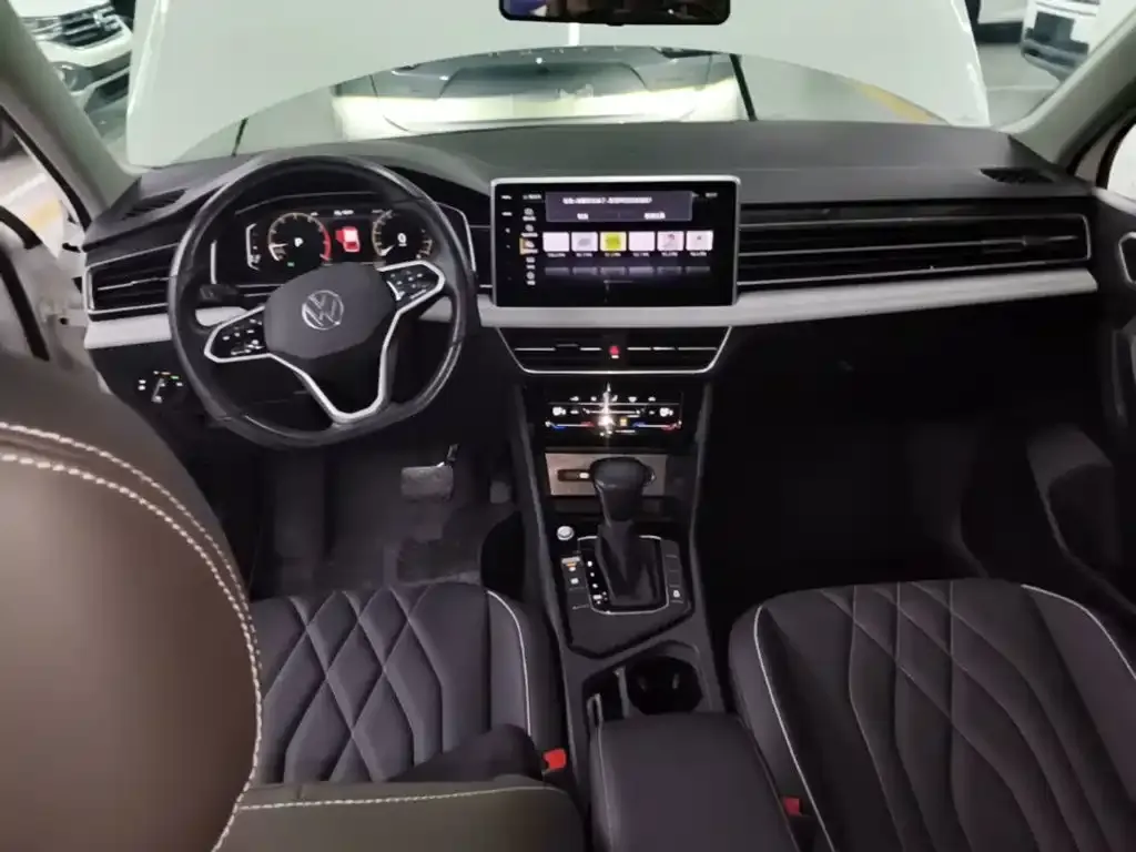 Volkswagen Tiguan L — фото 6