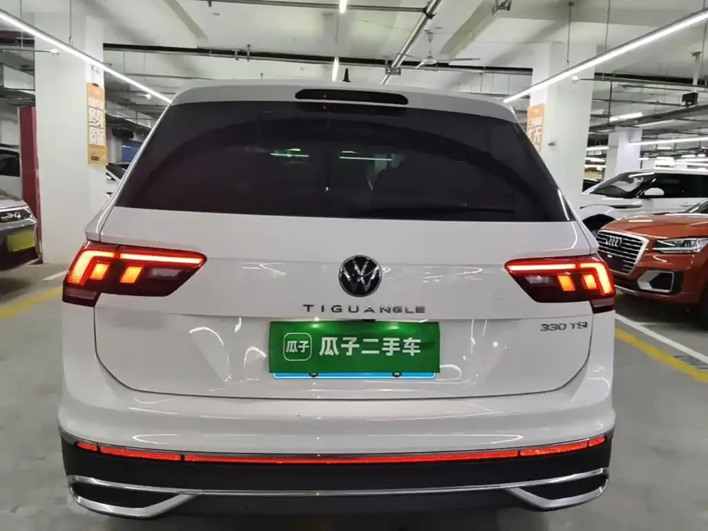 Volkswagen Tiguan L — фото 5