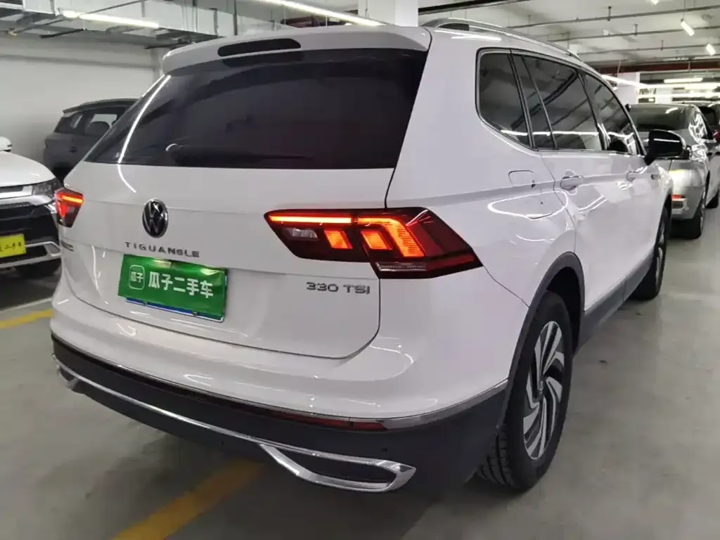 Volkswagen Tiguan L — фото 8