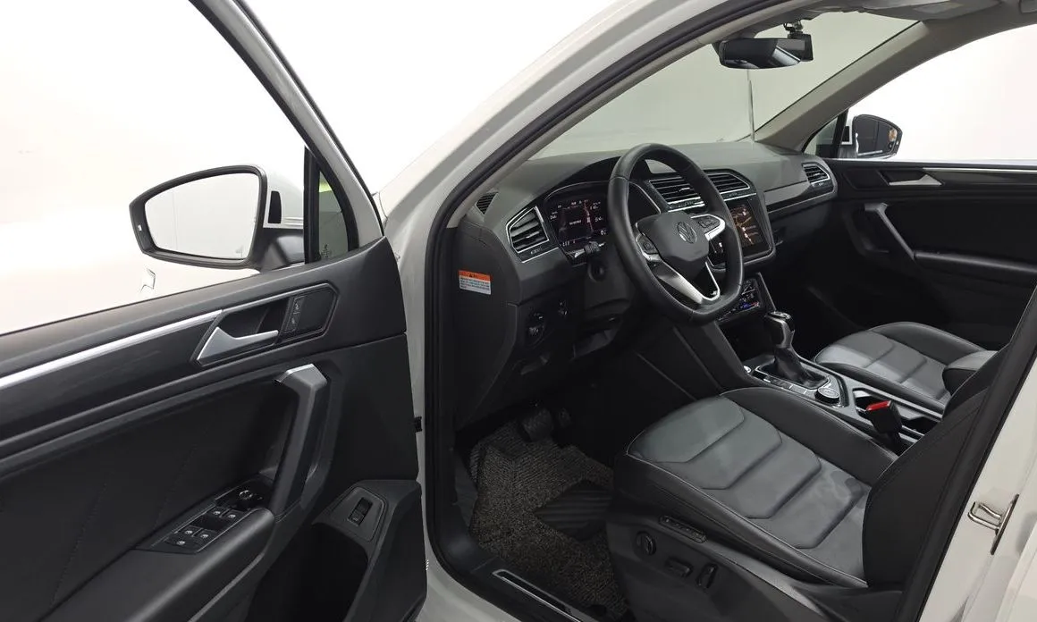 Volkswagen Tiguan — фото 5
