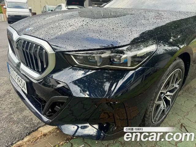 BMW 5-Series — фото 1