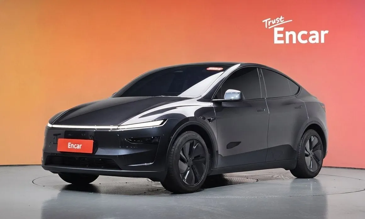 Tesla Model Y — фото 1
