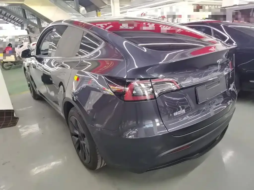 Tesla Model Y — фото 8