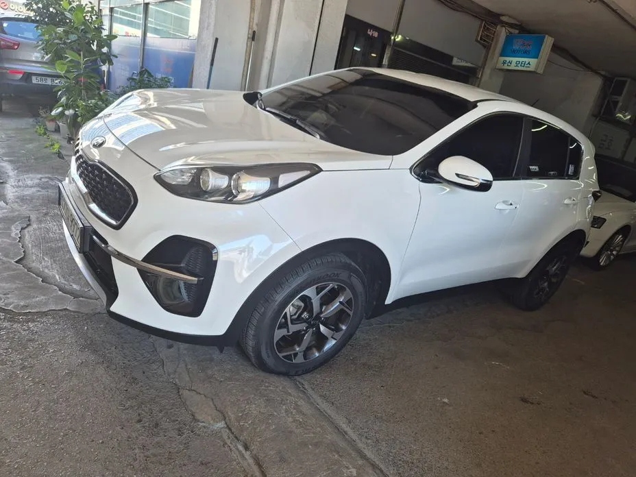 Kia Sportage — фото 1