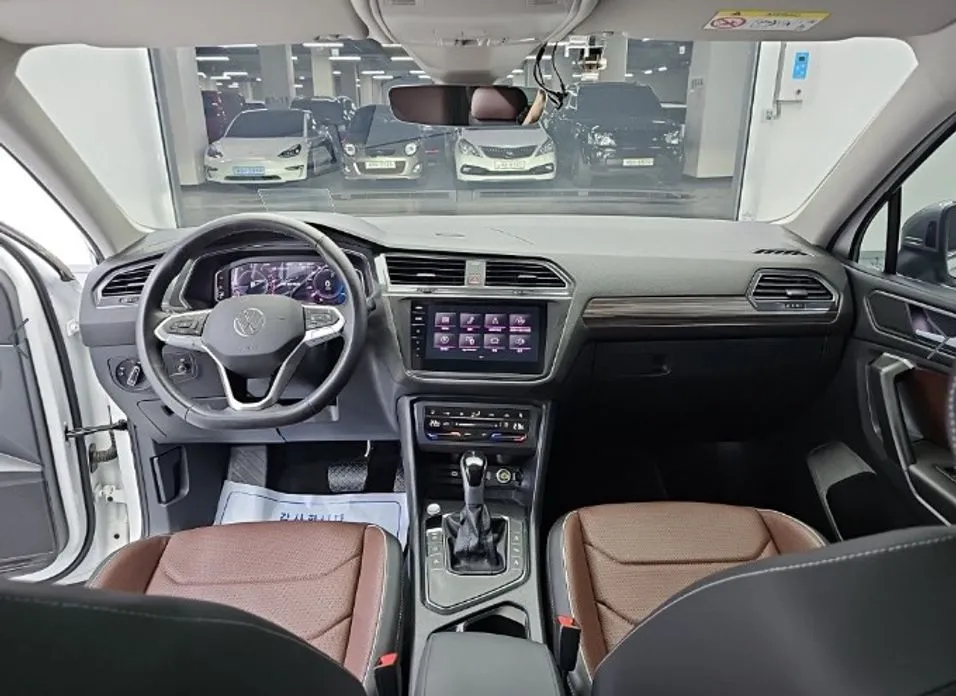Volkswagen Tiguan — фото 8
