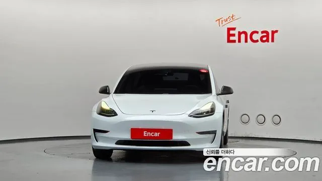 Tesla Model 3 — фото 10