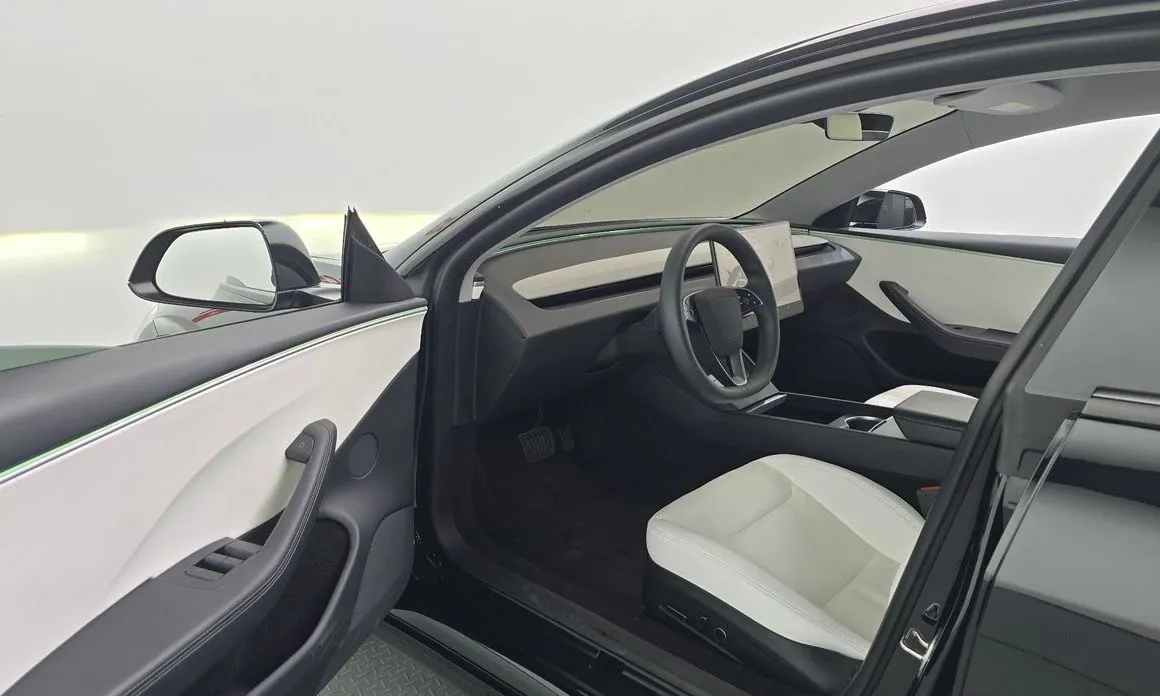 Tesla Model 3 — фото 8