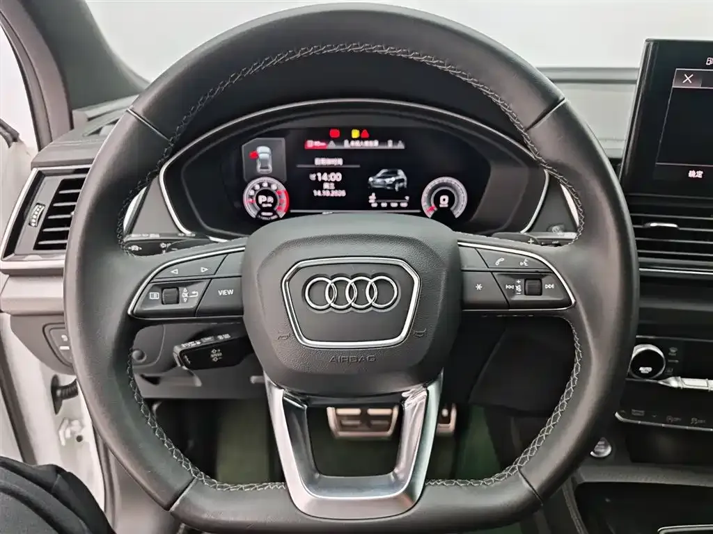 Audi Q5L — фото 10