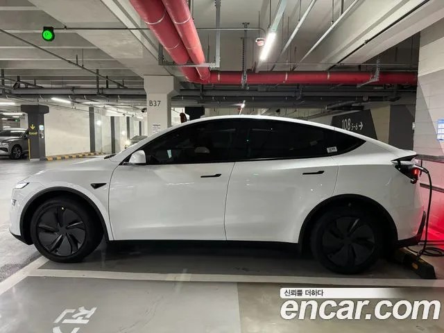 Tesla Model Y — фото 10