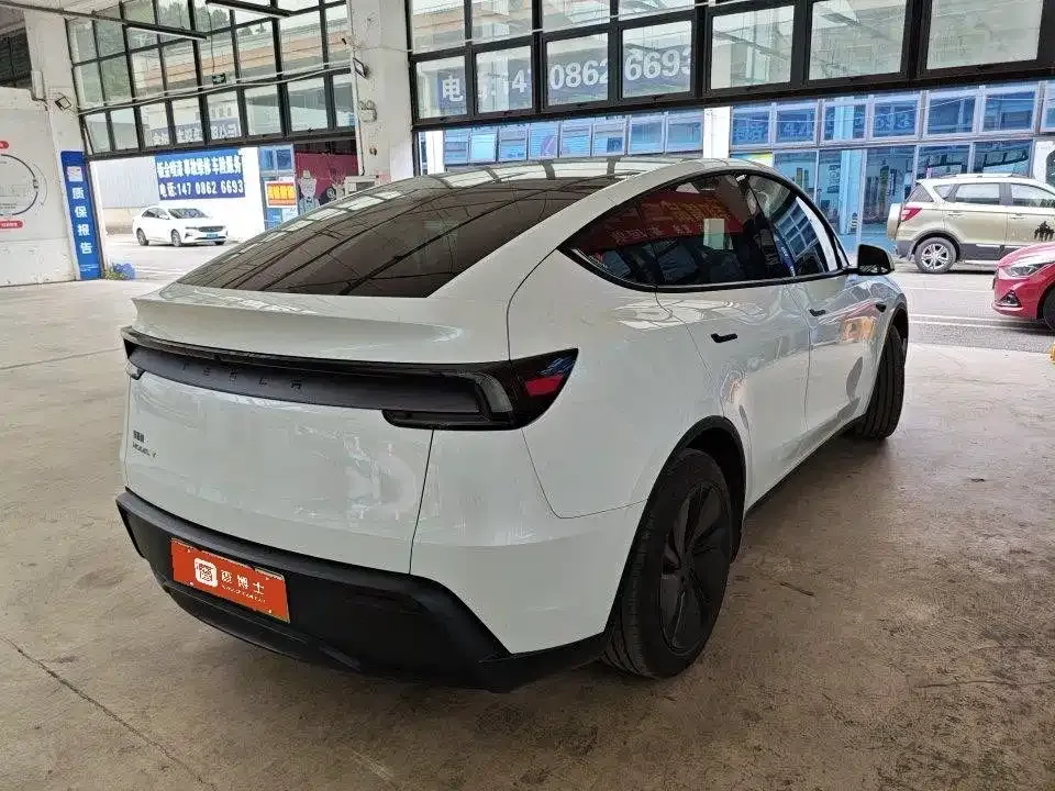 Tesla Model Y — фото 7