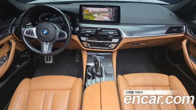 BMW 5-Series — фото 10