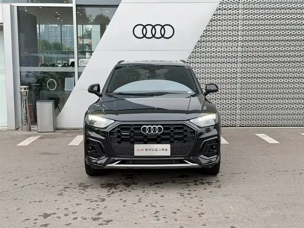 Audi Q5L — фото 10