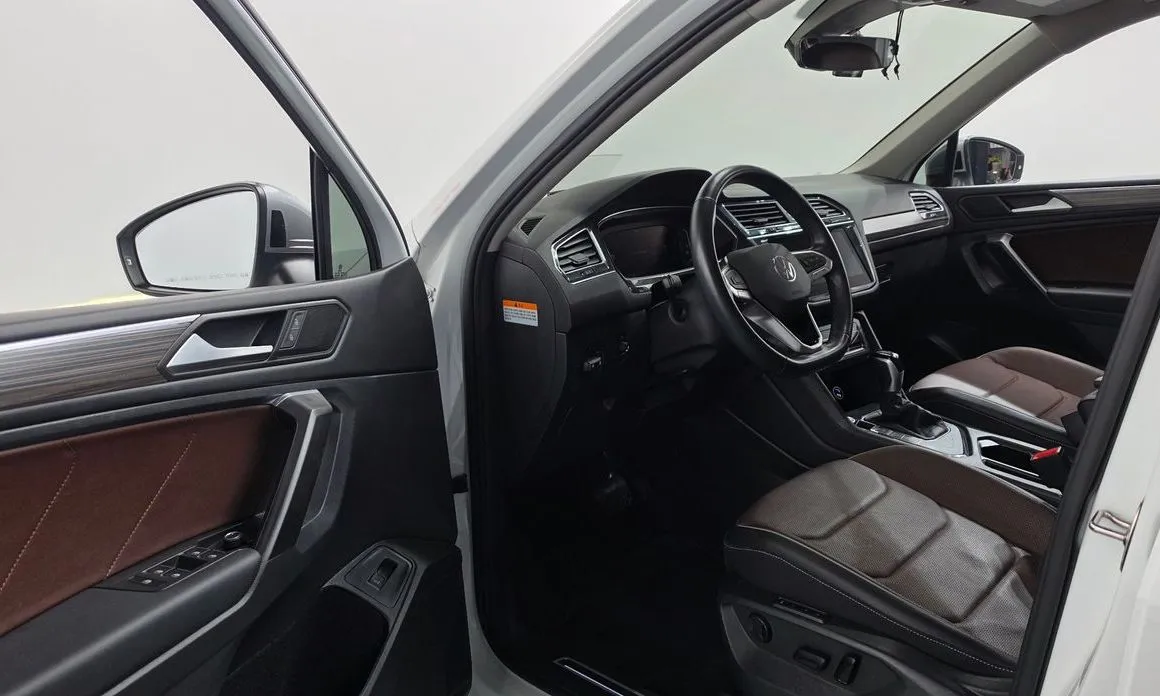 Volkswagen Tiguan — фото 10