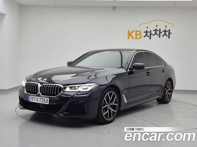BMW 5-Series — фото 1