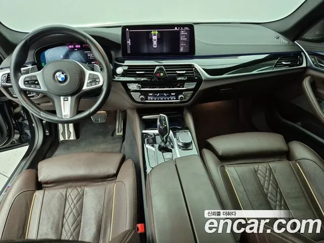 BMW 5-Series — фото 10