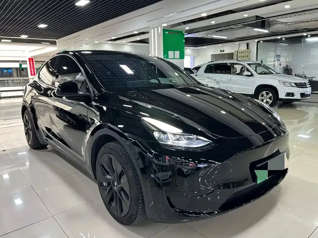 Tesla Model Y — фото 7
