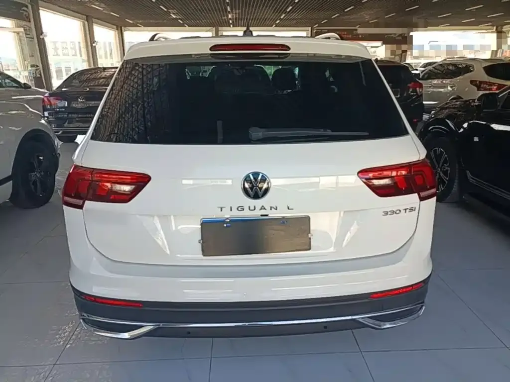 Volkswagen Tiguan L — фото 4