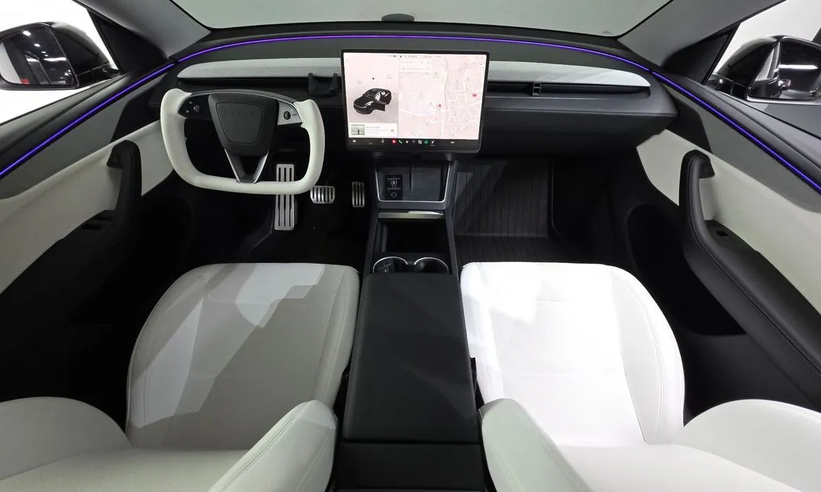 Tesla Model Y — фото 7