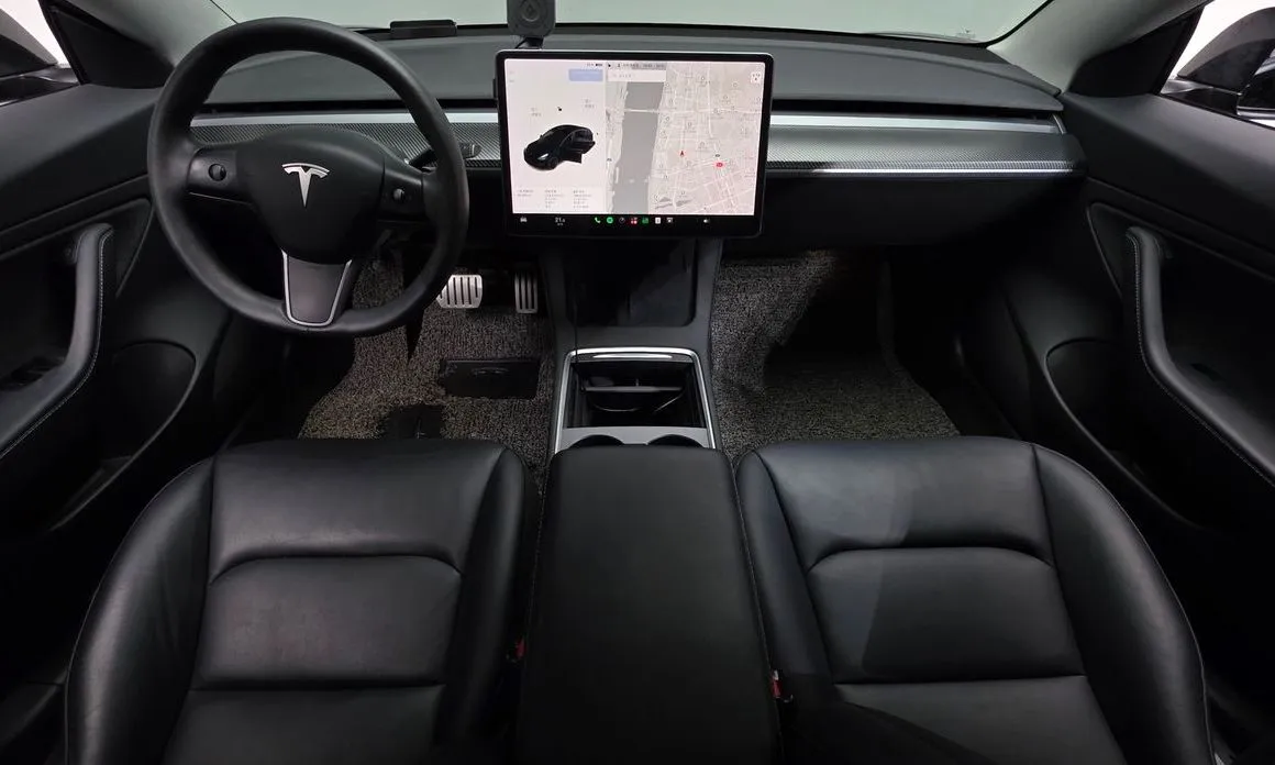 Tesla Model 3 — фото 9