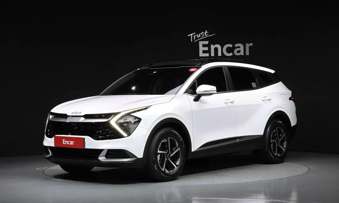 Kia Sportage — фото 1
