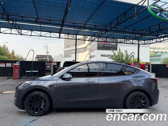 Tesla Model Y — фото 6