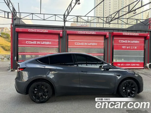Tesla Model Y — фото 5