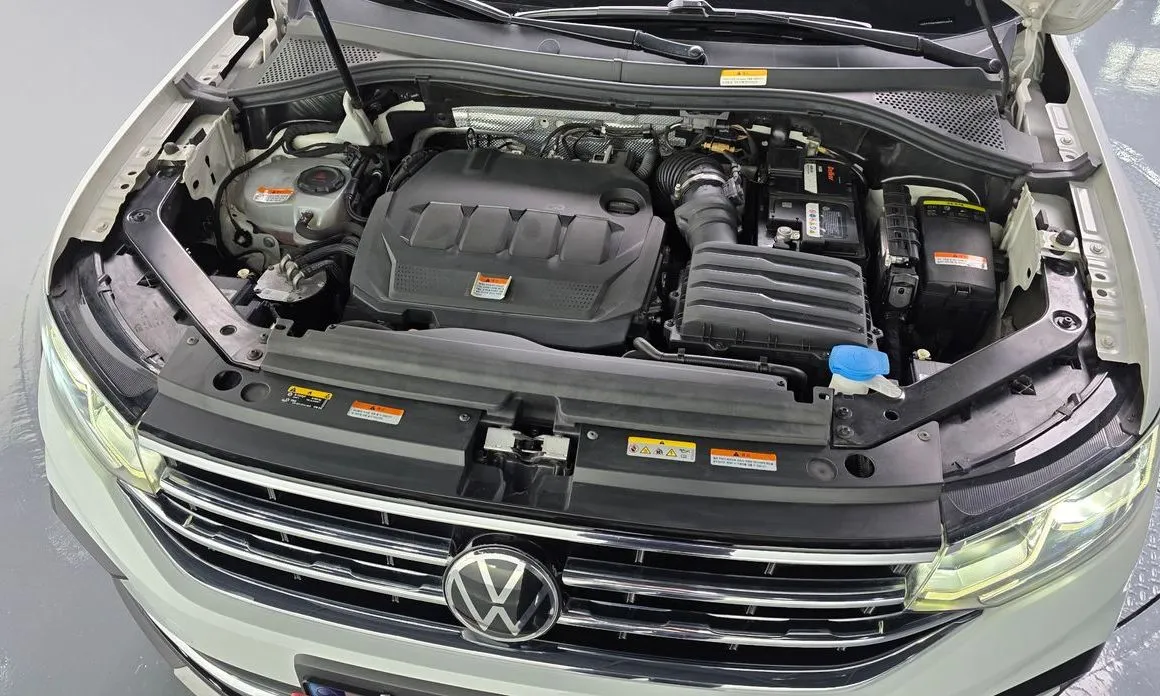 Volkswagen Tiguan — фото 8