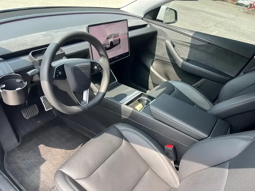Tesla Model Y — фото 7