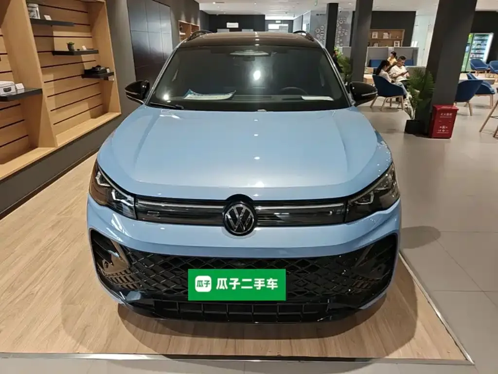 Volkswagen Tiguan L — фото 7