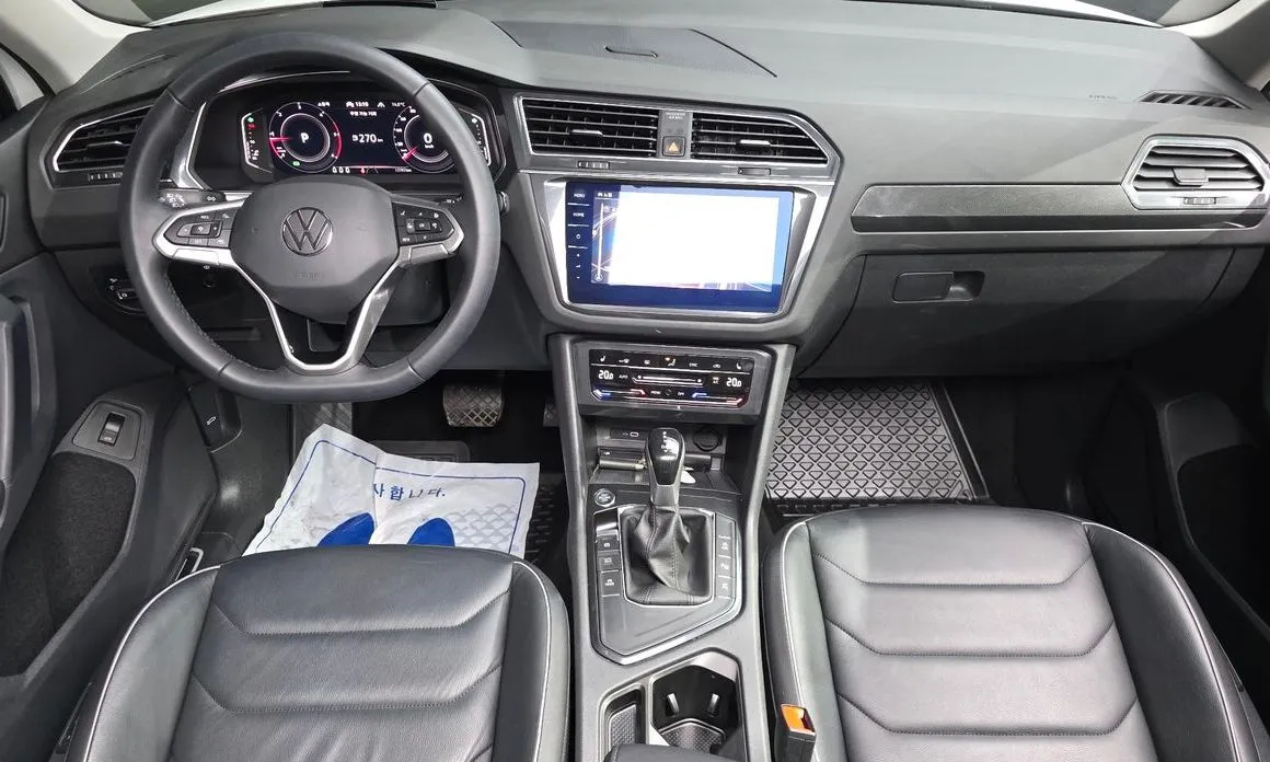 Volkswagen Tiguan — фото 9