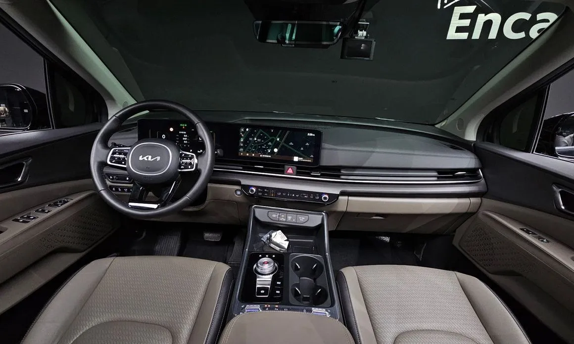Kia Carnival — фото 10