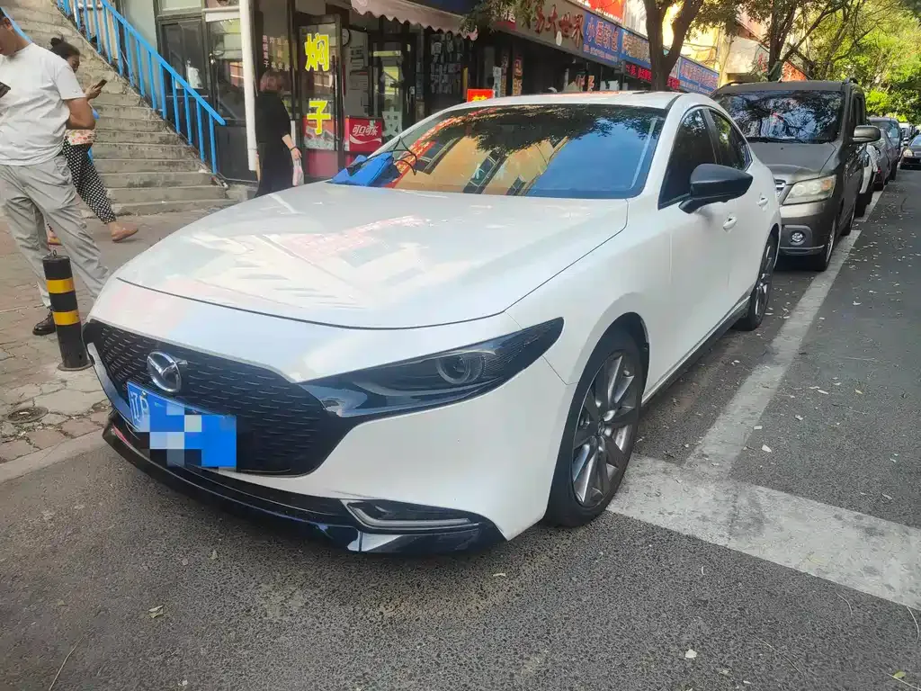 Mazda 3 Axela — фото 1