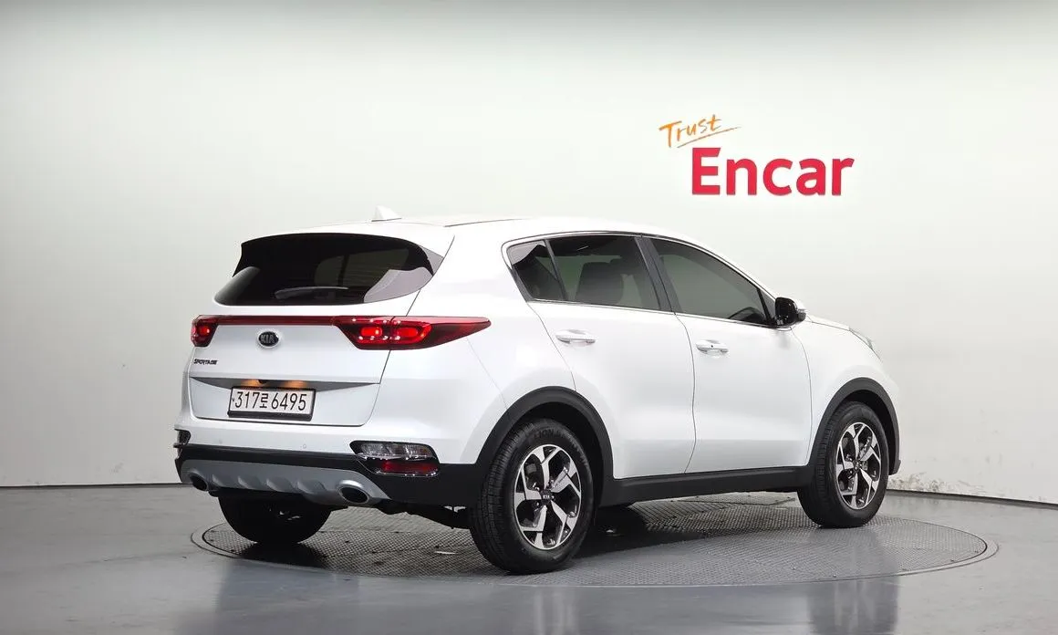 Kia Sportage — фото 5