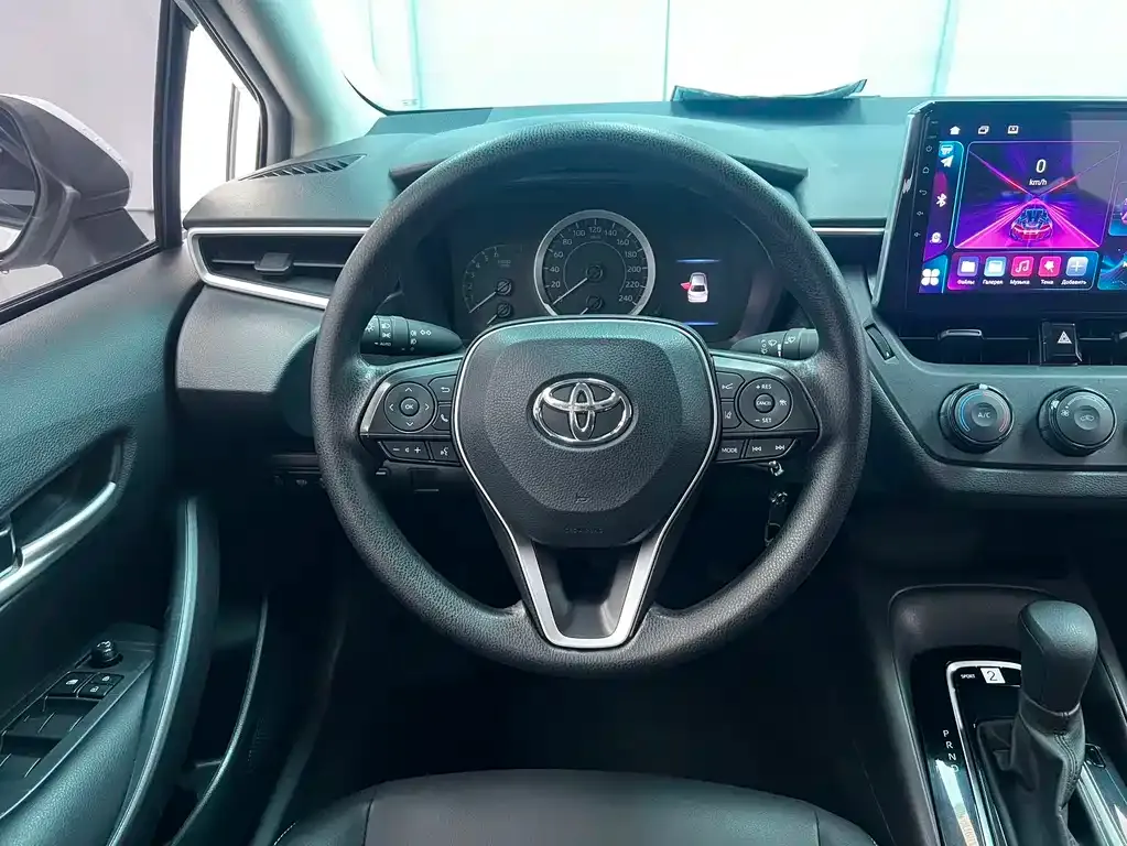 Toyota Corolla — фото 9