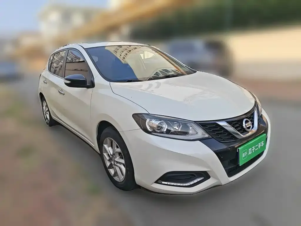 Nissan Tiida — фото 2