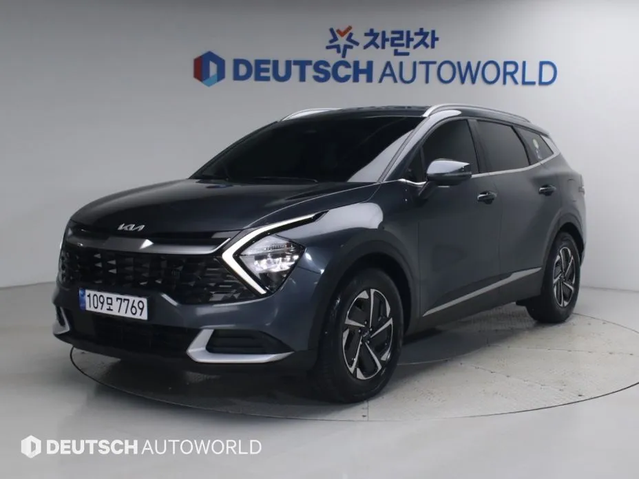 Kia Sportage — фото 1
