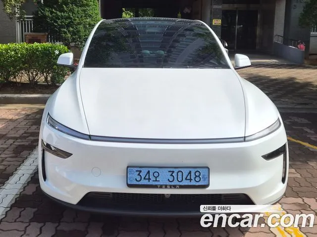 Tesla Model Y — фото 1