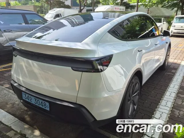 Tesla Model Y — фото 4