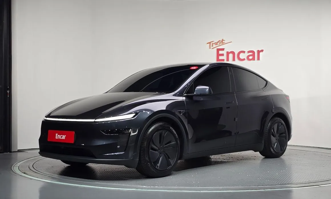 Tesla Model Y — фото 1
