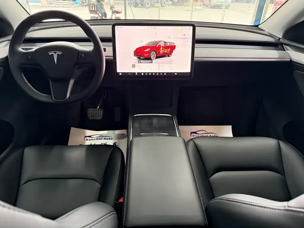 Tesla Model Y — фото 7